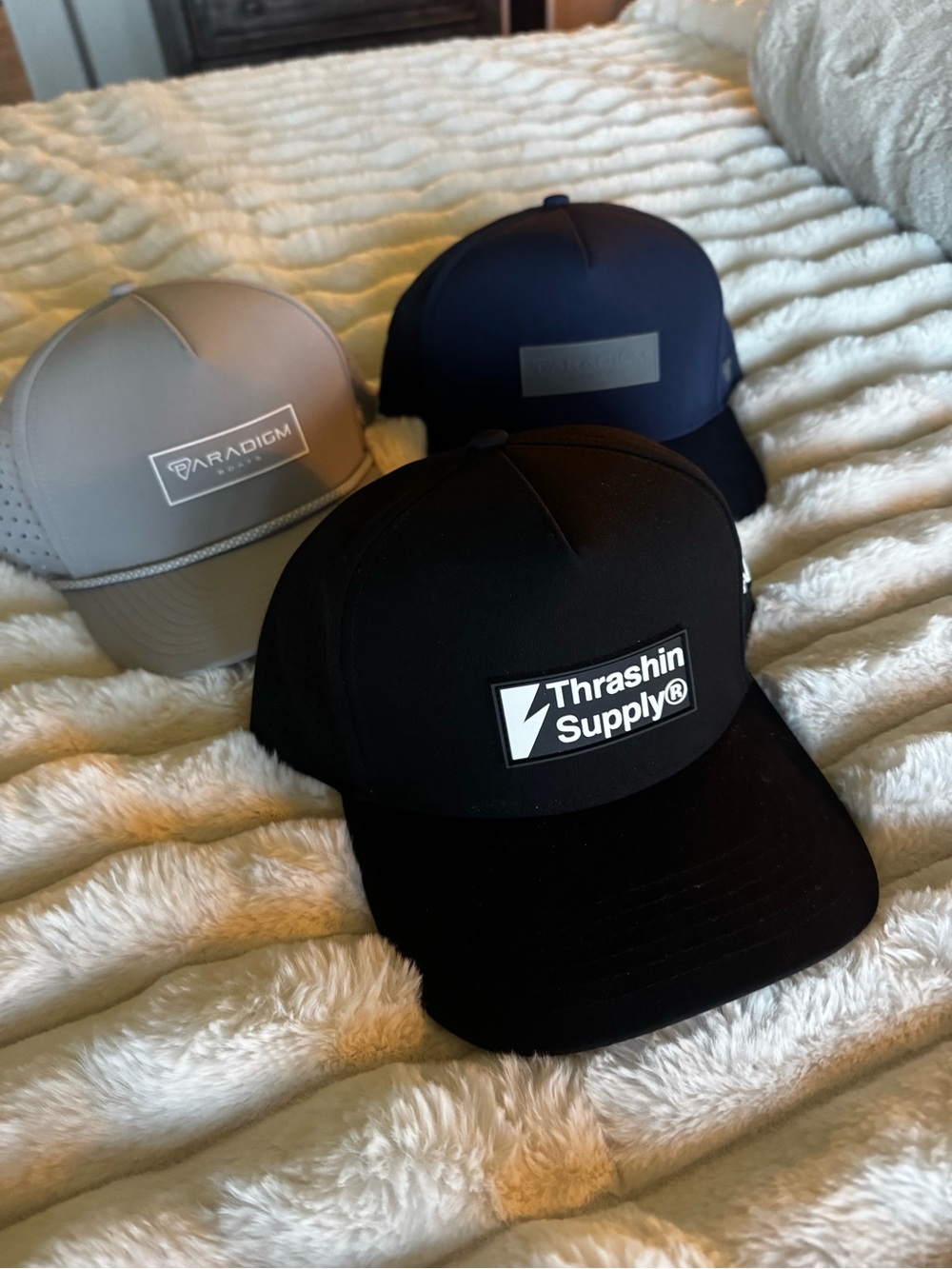 Brand new. Waterproof snap back hats.